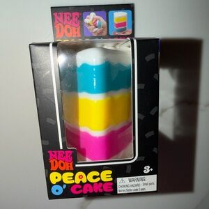 Nee Doh Peace O' Cake Soft Squishy Toy - Blue/Yellow/Pink